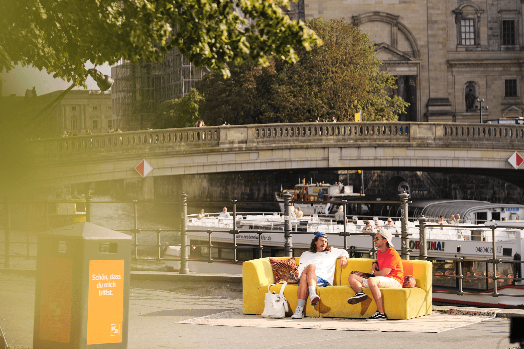 A yellow sofa in velvet in Berlin.